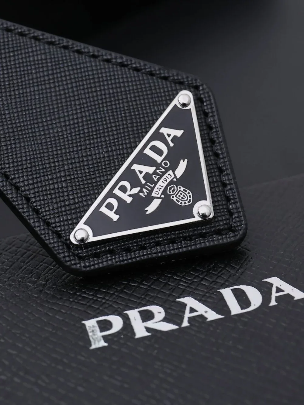 ✨ Prada Black Triangle Logo Leather Keychain